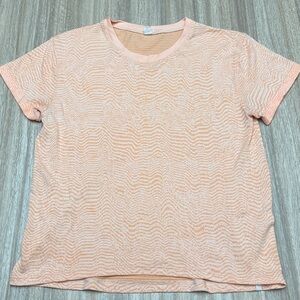 Lululemon Train to Be Short Sleeve shirt in a Ripple Wave White/Highlight Orange